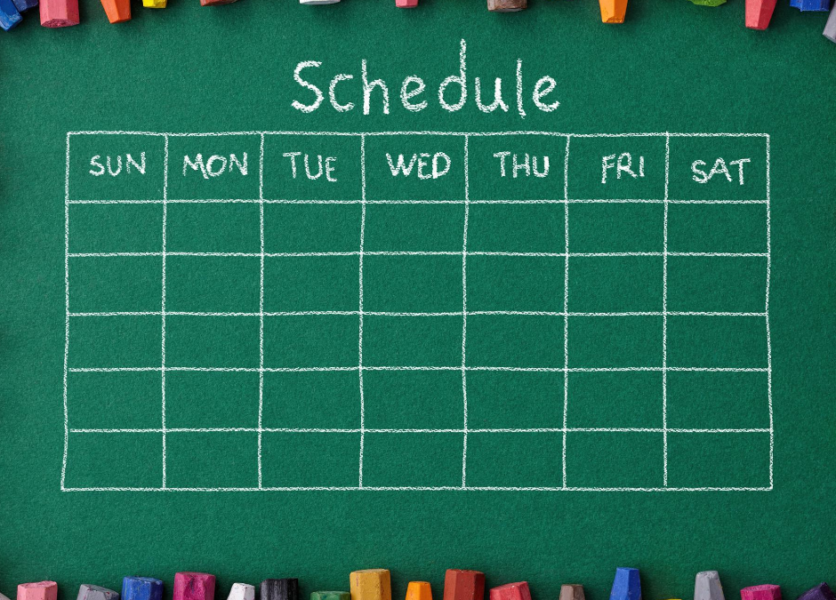 Blank weekly chalkboard schedule with colorful chalk